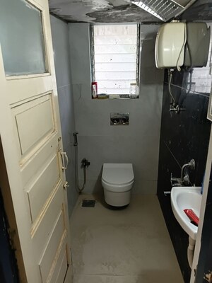 Bathroom in 1 BHK Apartment at Ganga Darshan CHS, Versova – for Rent