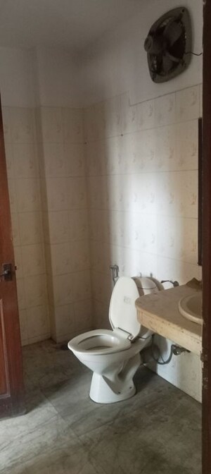 Bathroom in 4 BHK Builder Floor at Gulmohar Park – for Sale