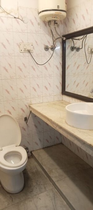 Bathroom in 4 BHK Builder Floor at Gulmohar Park – for Sale