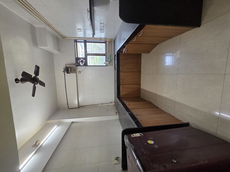 Kitchen, dhanraj-apartment-belavali 2 Bedroom 900 Sq.Ft. Apartment In Belawali Thane 10352091
