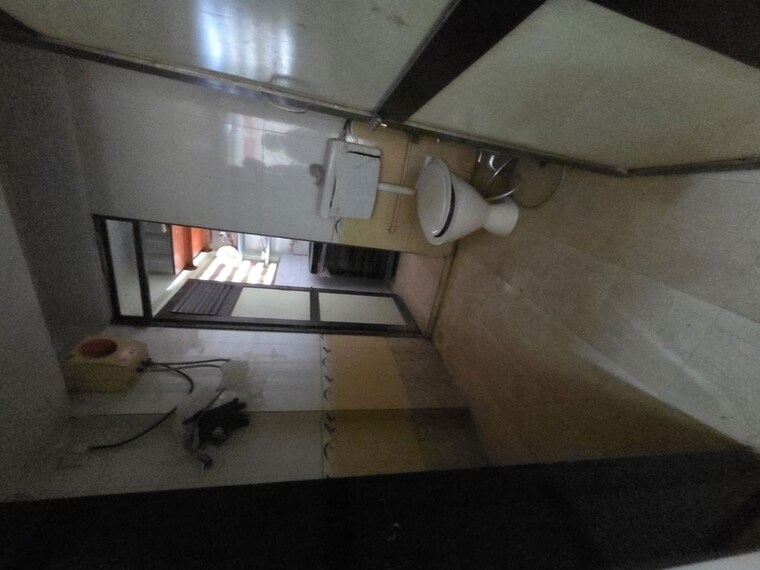 Living Room, dhanraj-apartment-belavali 2 Bedroom 900 Sq.Ft. Apartment In Belawali Thane 10352091