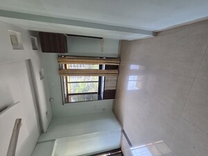 Building Lobby in 2 BHK Apartment at Dhanraj Apartment Belavali, Belawali – for Rent