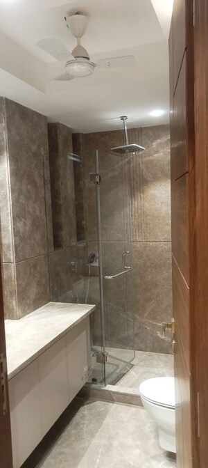 Bathroom in 4 BHK Builder Floor at Green Park – for Sale