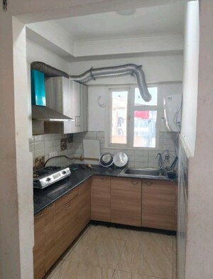 Kitchen in 2 BHK Apartment at Gaur Atulyam, Omicron I Greater Noida – for Rent