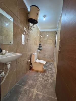 Bathroom in 1 BHK Apartment at Chattarpur – for Rent