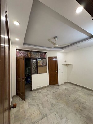Bedroom in 2 BHK Builder Floor at Kalkaji – for Rent