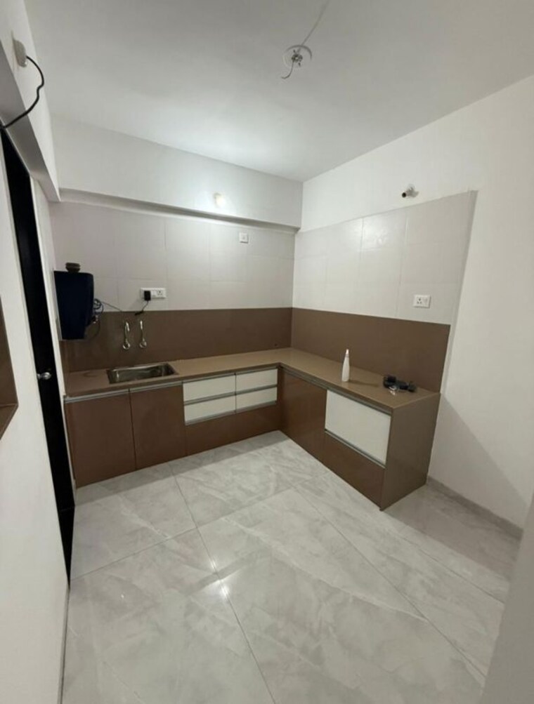 Kitchen, rr-lunkad-66-avenue 2 Bedroom 1200 Sq.Ft. Apartment In Pimple Nilakh Pune 10352488