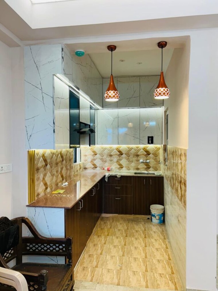 Kitchen, amrapali-kingswood 3 Bedroom 1115 Sq.Ft. Apartment In Sector 4 Greater Noida Greater Noida 10352524