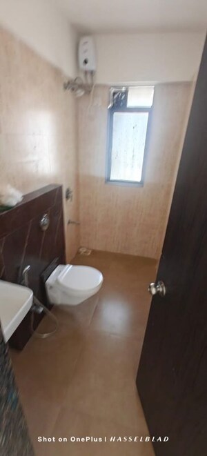 Bathroom in 2 BHK Apartment at Lotus Unity, Versova – for Rent