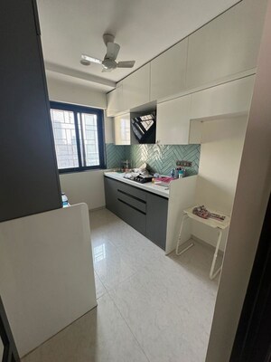 Kitchen in 2 BHK Apartment at Lashkaria Empress, Andheri West – for Rent