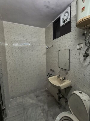 Bathroom in 2 BHK Apartment at Chittaranjan Park – for Rent