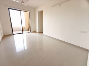 Living Room in 2 BHK Apartment at Kolte Patil Margosa Heights, Mohammadwadi – for Sale