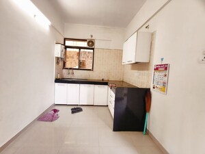 Kitchen in 2 BHK Apartment at Kolte Patil Margosa Heights, Mohammadwadi – for Sale