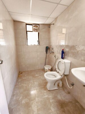 Bathroom in 2 BHK Apartment at Kolte Patil Margosa Heights, Mohammadwadi – for Sale