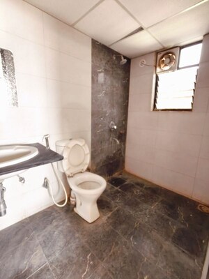 Bathroom in 2 BHK Apartment at Kolte Patil Margosa Heights, Mohammadwadi – for Sale