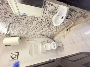 Bathroom in 2 BHK Builder Floor at Khirki Extension – for Rent