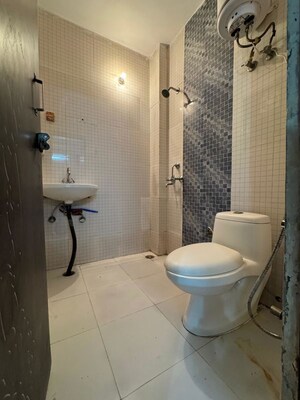 Bathroom in 3 BHK Apartment at Chattarpur – for Rent