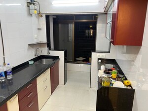 Kitchen in 2 BHK Apartment at United Unity Heights, Malad West – for Rent