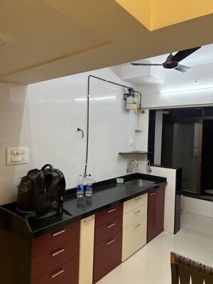 Team Area in 2 BHK Apartment at United Unity Heights, Malad West – for Rent