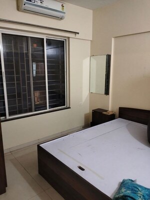 Room in 2 BHK Apartment at Varad Pushp Vatika, Nibm Road – for Rent