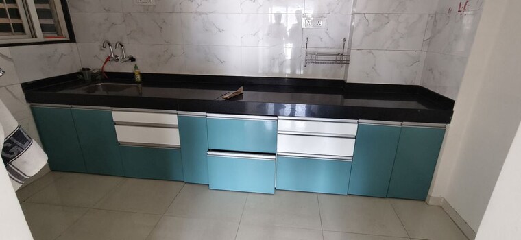 Kitchen, kamgar putala vasahat 2 Bedroom 856 Sq.Ft. Apartment In Kamgar Putala Vasahat Pune 10352958