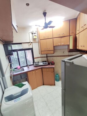 Kitchen in 2 BHK Apartment at Planet Powai CHS, Powai – for Rent