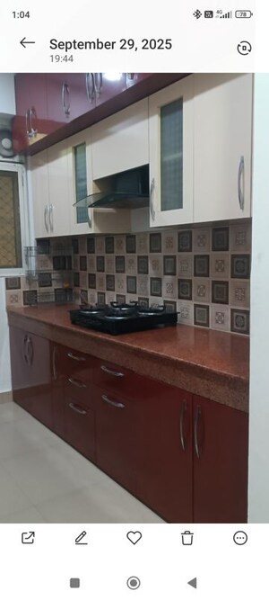 Kitchen in 3 BHK Apartment at Uninav Heights Phase I, Raj Nagar Extension – for Rent