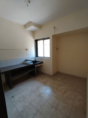 Kitchen in 1 BHK Apartment at Vijay Apartment 3 CHS, Ghodbunder Road – for Sale
