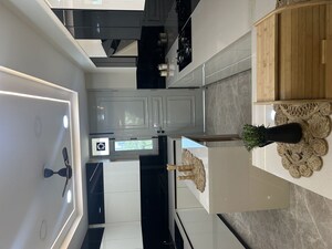 Kitchen in 4 BHK Apartment at M3M Altitude, Sector 65 – for Sale