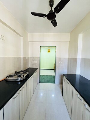 Kitchen in 2 BHK Apartment at Hiranandani Estate, Ghodbunder Road – for Rent
