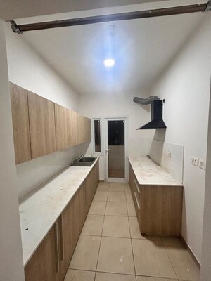 Kitchen in 2 BHK Apartment at Bhartiya Nikoo Homes, Thanisandra Main Road – for Rent