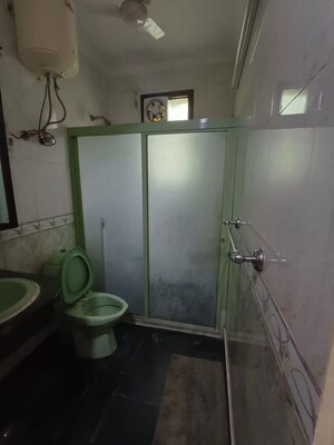 Bathroom in 3 BHK Apartment at Zamrudpur – for Rent