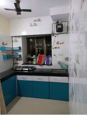 Kitchen in 1 BHK Apartment at Runwal Garden City, Balkum Pada – for Rent