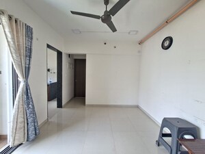 Living Room in 1 BHK Apartment at Runwal Eirene, Balkum Pada – for Rent