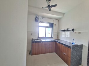 Kitchen in 1 BHK Apartment at Runwal Eirene, Balkum Pada – for Rent