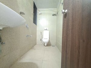 Bathroom in 1 BHK Apartment at Runwal Eirene, Balkum Pada – for Rent