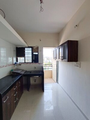 Kitchen in 2 BHK Apartment at Gopiram Radhey Heights, Ravet – for Rent
