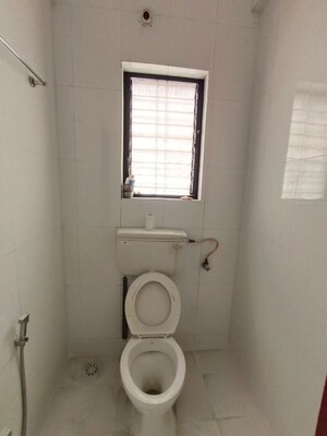 Bathroom in 2 BHK Apartment at Gopiram Radhey Heights, Ravet – for Rent