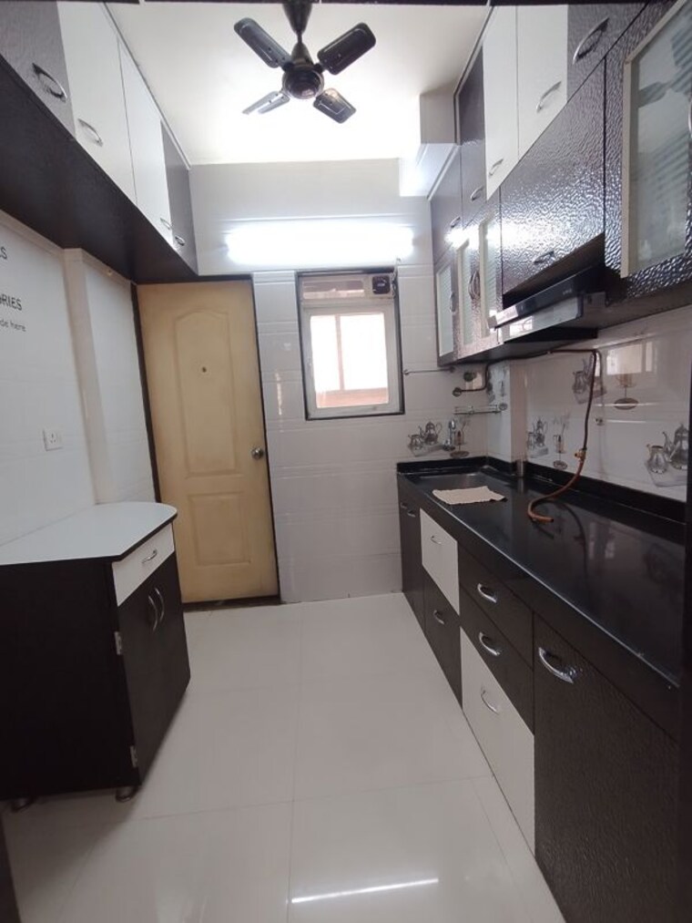 Kitchen, cosmos-orchid 1 Bedroom 415 Sq.Ft. Apartment In Ghodbunder Road Thane 10353599