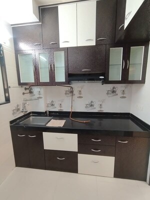 Kitchen in 1 BHK Apartment at Cosmos Orchid, Ghodbunder Road – for Rent