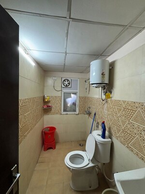 Bathroom in 3 BHK Apartment at Mahagun My Woods, Sector 16c Greater Noida – for Rent