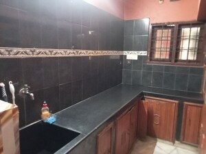 Kitchen in 2 BHK Apartment at Vijayanagar Colony – for Sale