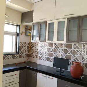 Kitchen in 2 BHK Apartment at Shraddha Evoque, Sonapur – for Rent