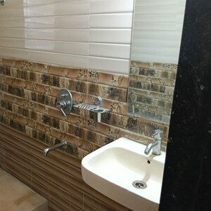 Bathroom in 2 BHK Apartment at Shraddha Evoque, Sonapur – for Rent