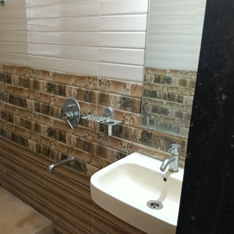 Bathroom, shraddha-evoque 2 Bedroom 510 Sq.Ft. Apartment In Sonapur Mumbai 10353759