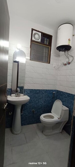 Bathroom in 3 BHK Builder Floor at Freedom Fighters Enclave – for Rent