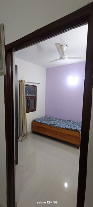 Bedroom in 3 BHK Builder Floor at Freedom Fighters Enclave – for Rent
