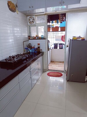 Kitchen in 2 BHK Apartment at Vanashree Apartment, Hadapsar – for Rent