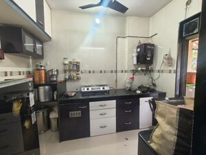 Kitchen in 2 BHK Apartment at Nature Glory Apartment, Kalwa – for Sale