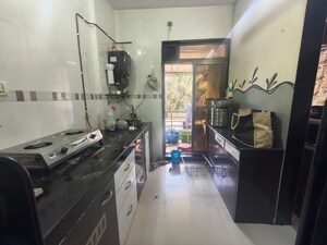 Kitchen in 2 BHK Apartment at Nature Glory Apartment, Kalwa – for Sale